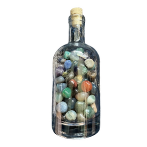 Bottle of gemstones/crystals